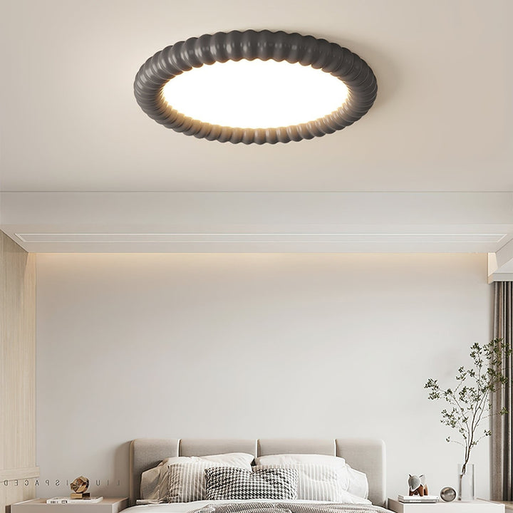 Lámpara de salón LED con diseño ondulado, iluminación moderna y decorativa para espacios minimalistas.