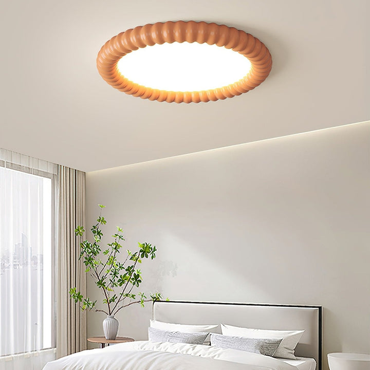 Lámpara decorativa LED de techo estilo minimalista ondulado para iluminación moderna del hogar.