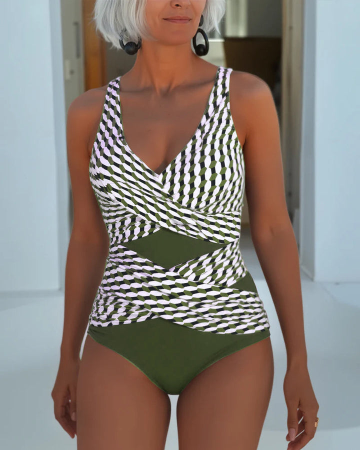 Bañador mujer elegante con escote en V, efecto moldeador, y tirantes ajustables para un estilo veraniego.