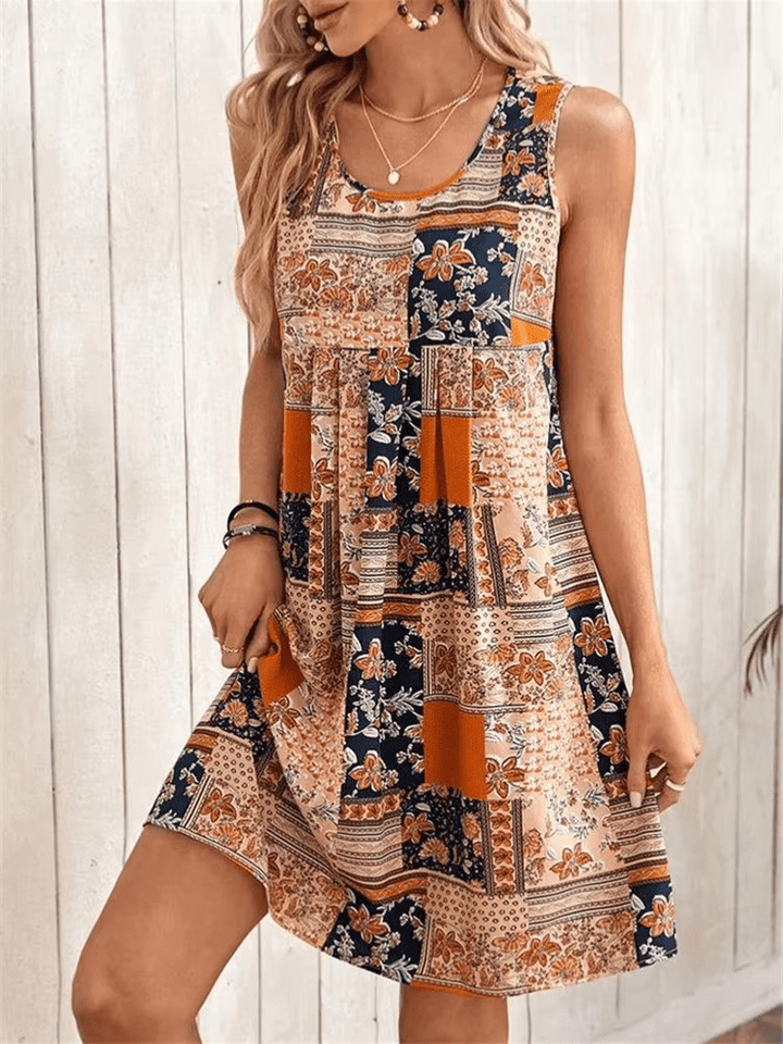 Vestido mini bohemio sin mangas para mujer, estampado floral, ideal para verano y look casual.