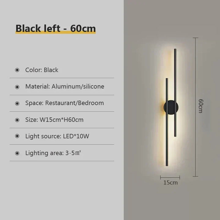 Lámpara decorativa LED de pared con doble haz. Acabado negro y dorado para un toque moderno en tu hogar.