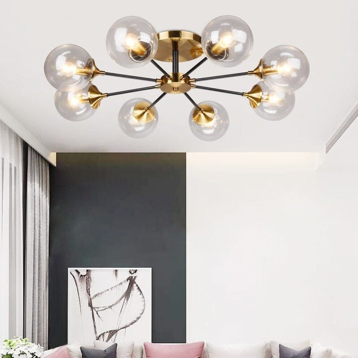 Luminaria de techo con 8 esferas decorativas en tono jade, aportando luz cálida y estilo contemporáneo.