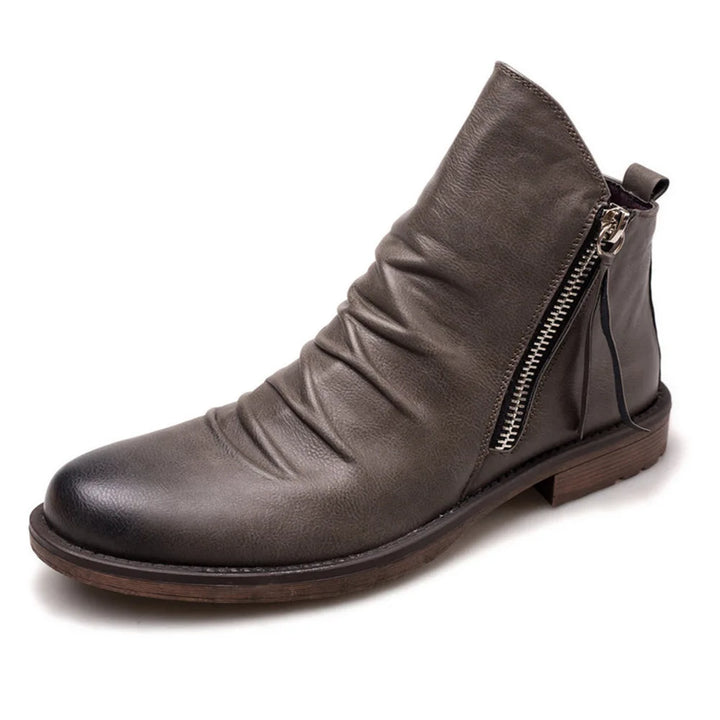 Zapatos de hombre: Botas Chelsea masculinas, perfectas para un look de vestir o casual. Elegancia y versatilidad.