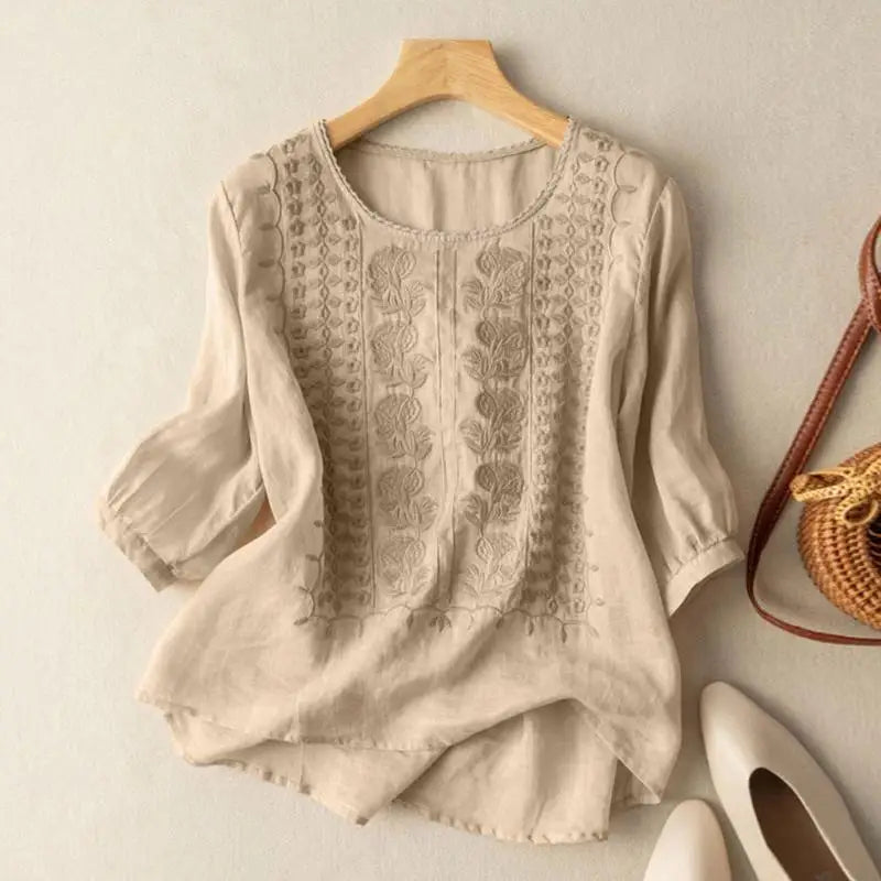 Blusa bordada para mujer con diseño artesanal, escote V y manga larga. Perfecta para estilo bohemio y ropa casual.