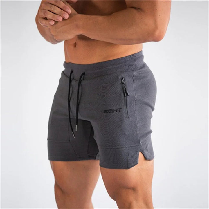 Pantalones cortos deportivos de hombre con cordón ajustable y bolsillos laterales.