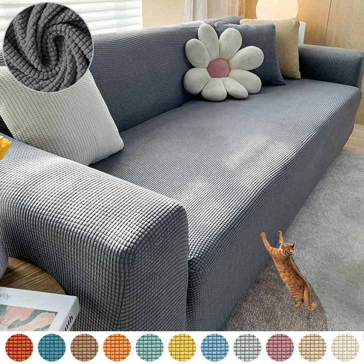 Protector de sofá impermeable, elástico. Cubierta resistente para tu sala de estar y familia.