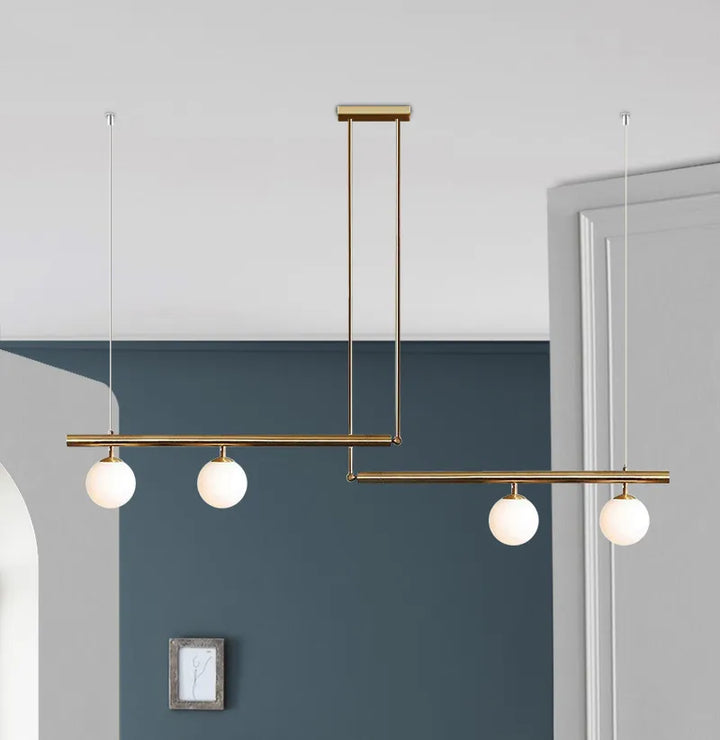 Moderna lámpara colgante LED para comedor, diseño minimalista en cristal y metal.