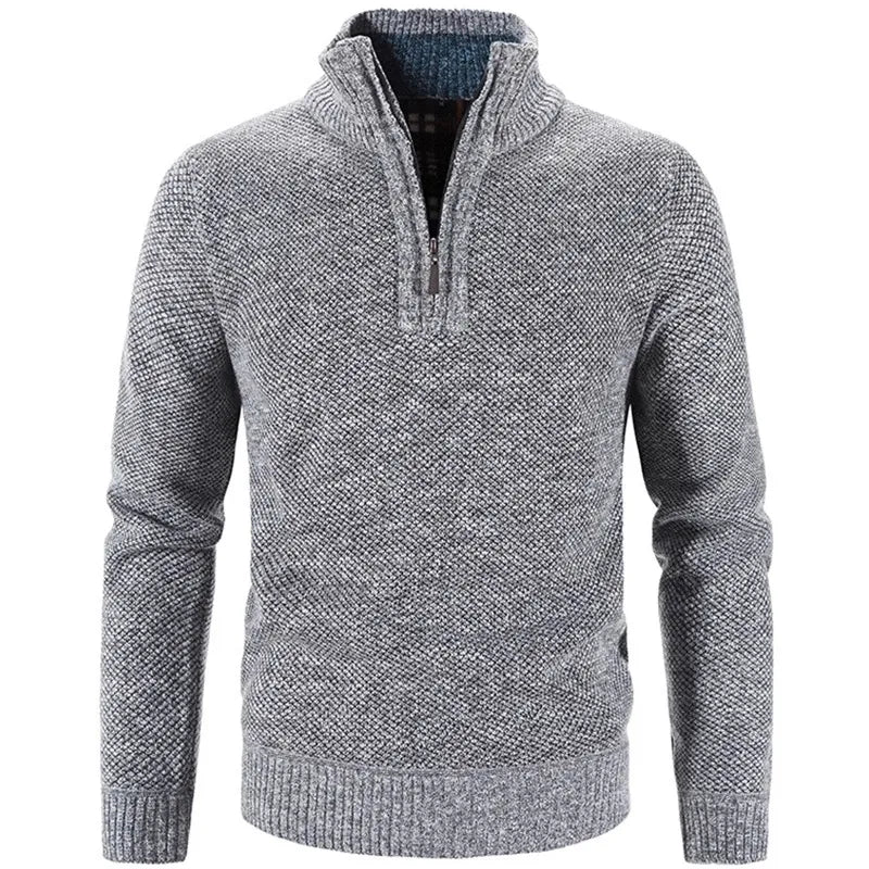 Jersey de hombre gris oscuro con media cremallera. Prenda cómoda y cálida, esencial para invierno y otoño.