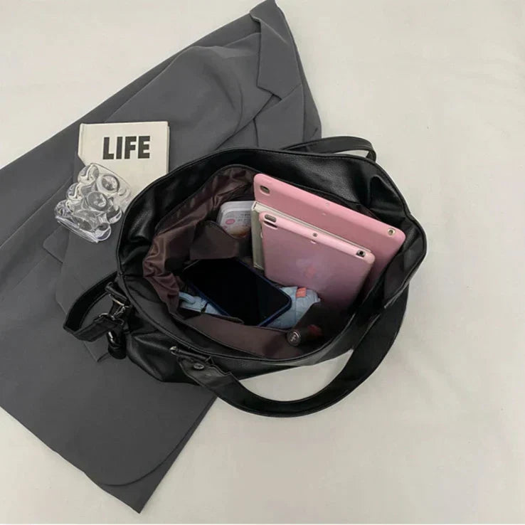 Bolso grande blanco de cuero suave para mujer. Ideal como organizador diario.