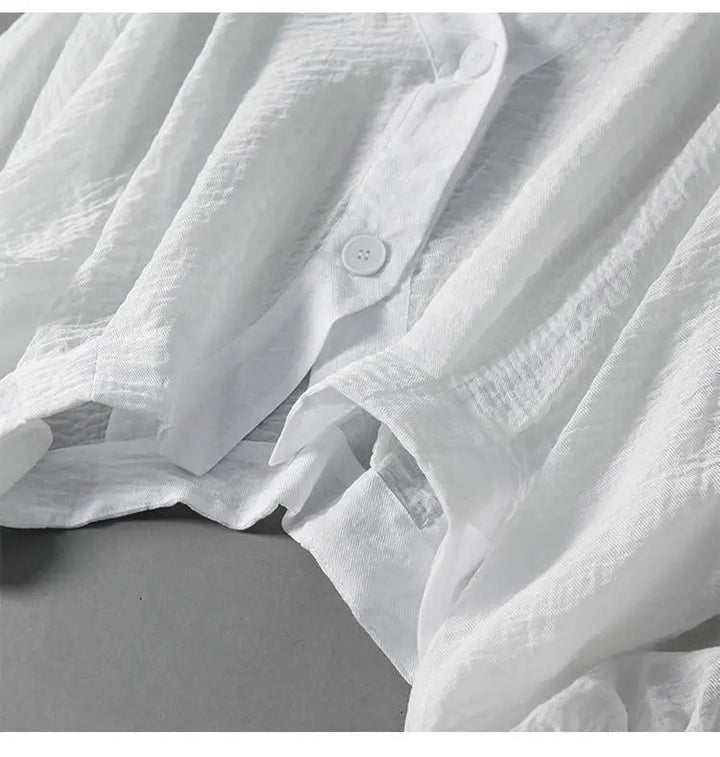 Blusa de mujer transpirable con manga globo y escote V. Estilo casual chic, ideal para temporadas cálidas.
