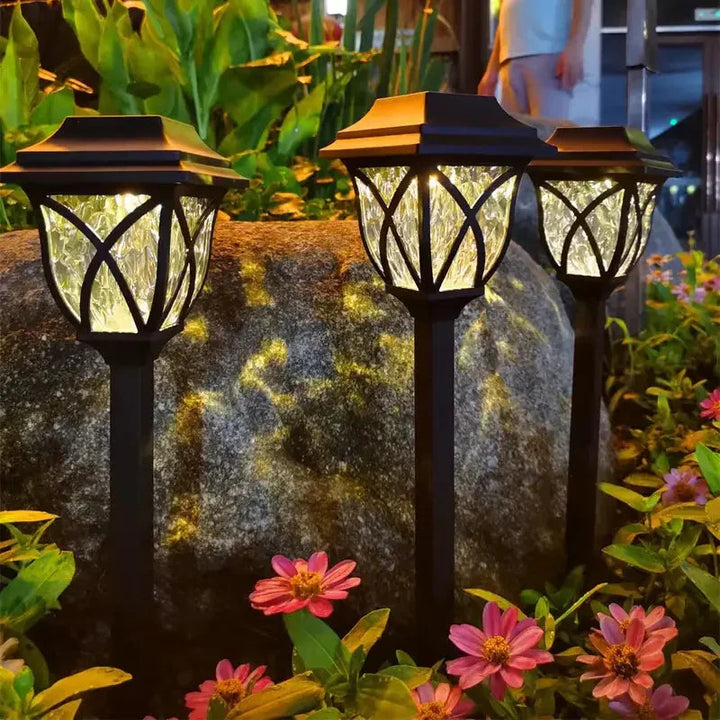 Lámpara solar LED para jardín, elegante iluminación exterior que decora tu terraza.