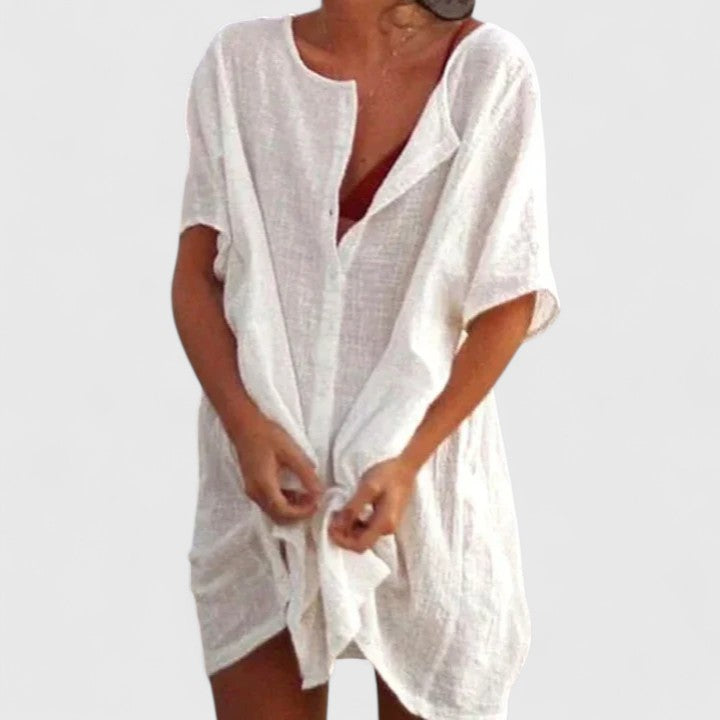 Vestido túnica de mujer elegante con escote V profundo y corte suelto. Ideal para verano y playa.
