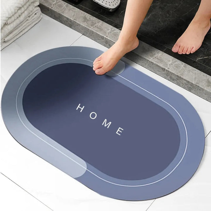 Alfombrilla antideslizante en baño moderno, color beige, aporta seguridad y estilo al hogar.