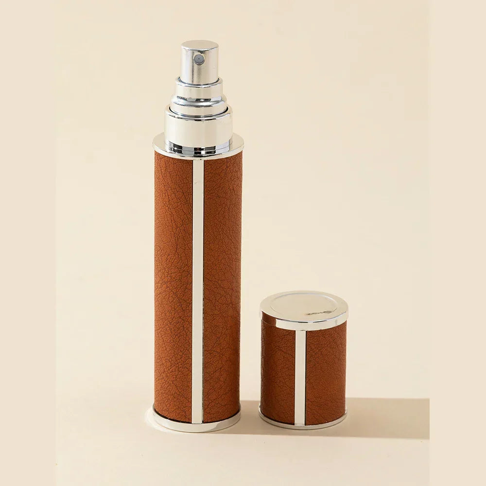 Tu fragancia portátil: mini dispensador de perfume 10ml, recargable, antifugas para viajes.