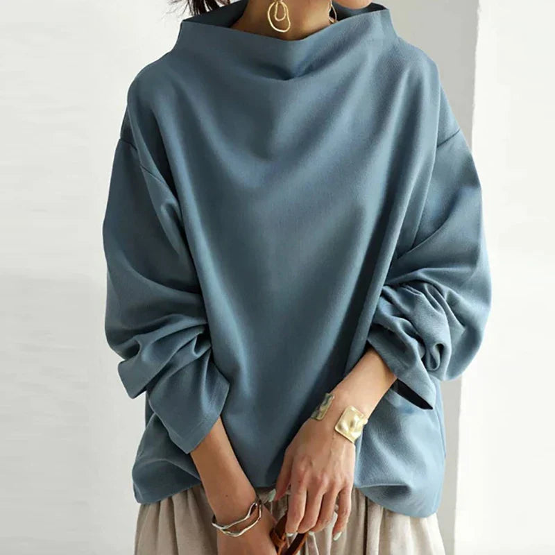Jersey de invierno para mujer, estilo holgado con cuello alto. Ideal para comodidad diaria y moda casual.