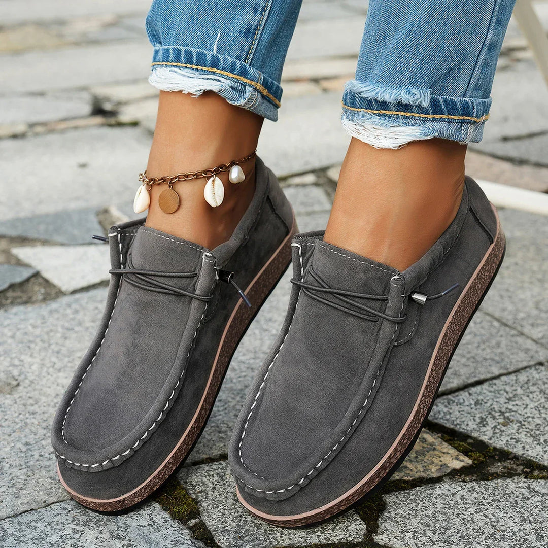 Zapatos de mujer gris slip-on ultra-ligeros y transpirables para caminar con máximo confort y bienestar.