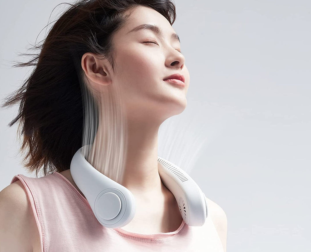 Ventilador de cuello sin aspas con flujo de aire 360°. Portátil y recargable, para frescura en cualquier lugar.