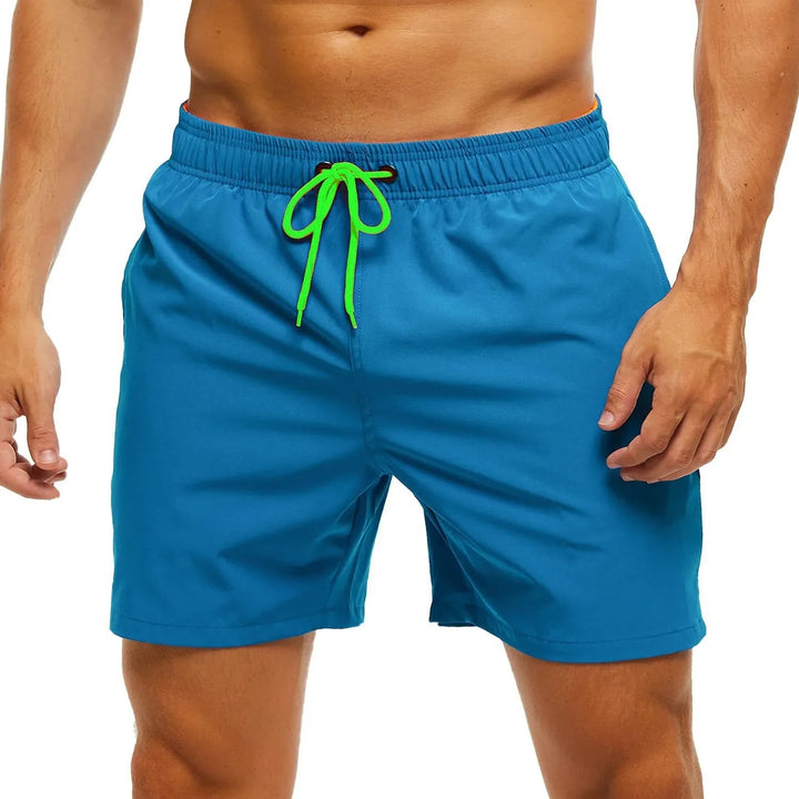 Moda masculina: bañador corto liso para hombre, cómodo y con bolsillo de cremallera. Perfecto para la playa.