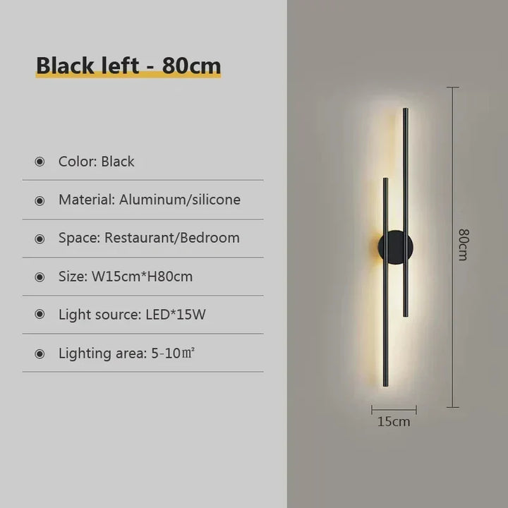 Sofisticada lámpara de pared LED doble haz, diseño contemporáneo negro y dorado. Perfecta para el hogar.