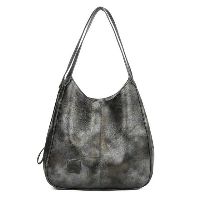 Bolso grande de piel sintética para mujer, estilo vintage y elegante. Accesorio ideal para el hombro.