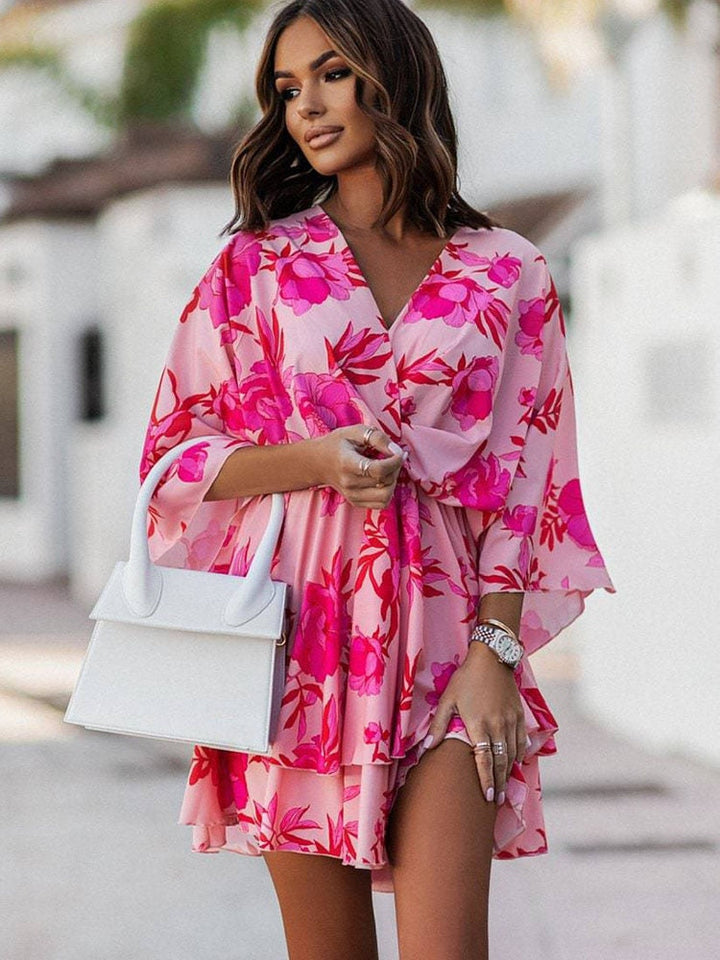 Vestido mini floral para mujer, estilo primaveral, con escote en V y detalles elegantes.