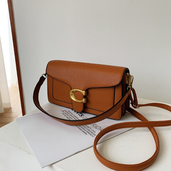 Bolso de hombro chic para mujer. Accesorio de moda versátil con gran organización interna para uso diario cómodo.