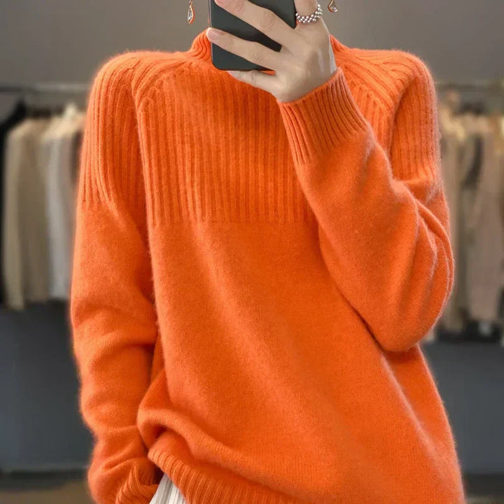 Elegante suéter de punto con cuello alto para mujer, ideal para comodidad y estilo en el invierno.