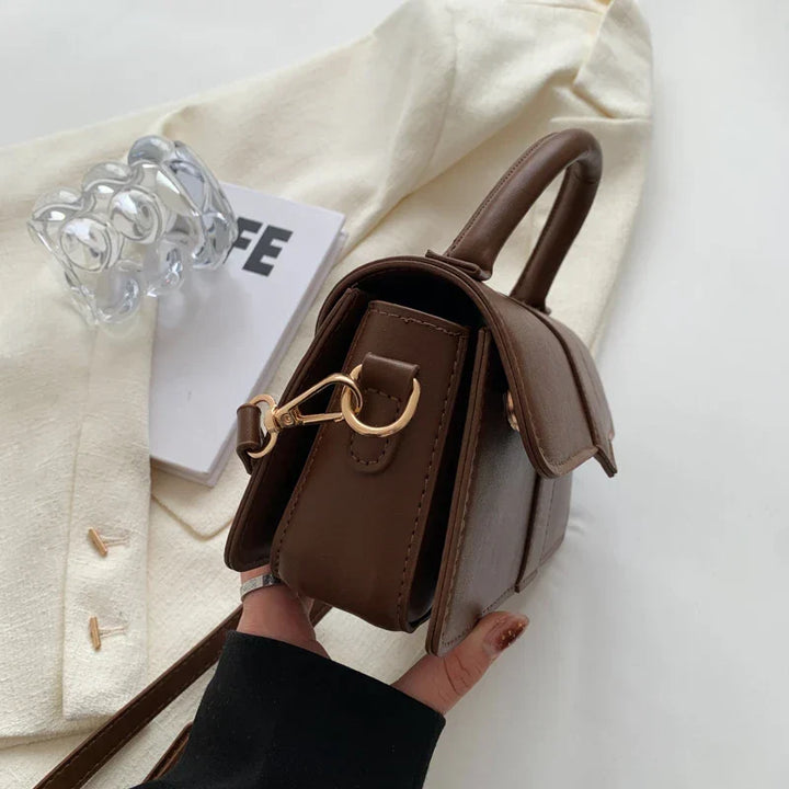 Bolso de hombro para mujer, diseño contemporáneo, combina elegancia y practicidad para el uso diario.
