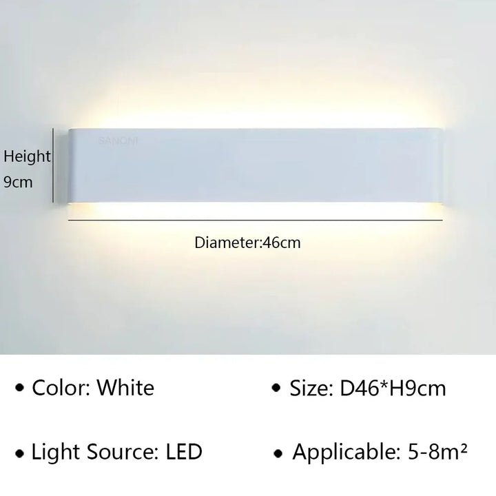 Aplique LED blanco minimalista, integración perfecta en paredes claras.