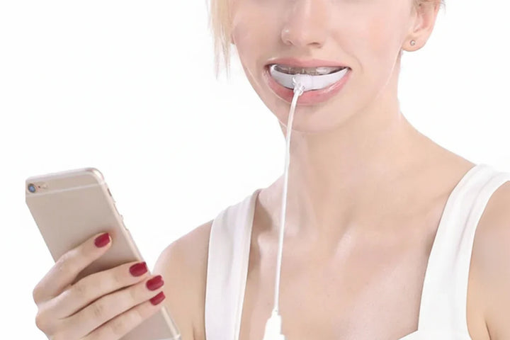 Cuidado bucal avanzado con terapia de luz roja. Promueve encías sanas y la recuperación dental en hogar.