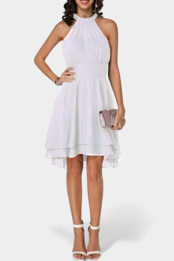 Vestido Anouk chic con volantes y corte ajustado. Ropa femenina de moda, elegancia atemporal para mujer.