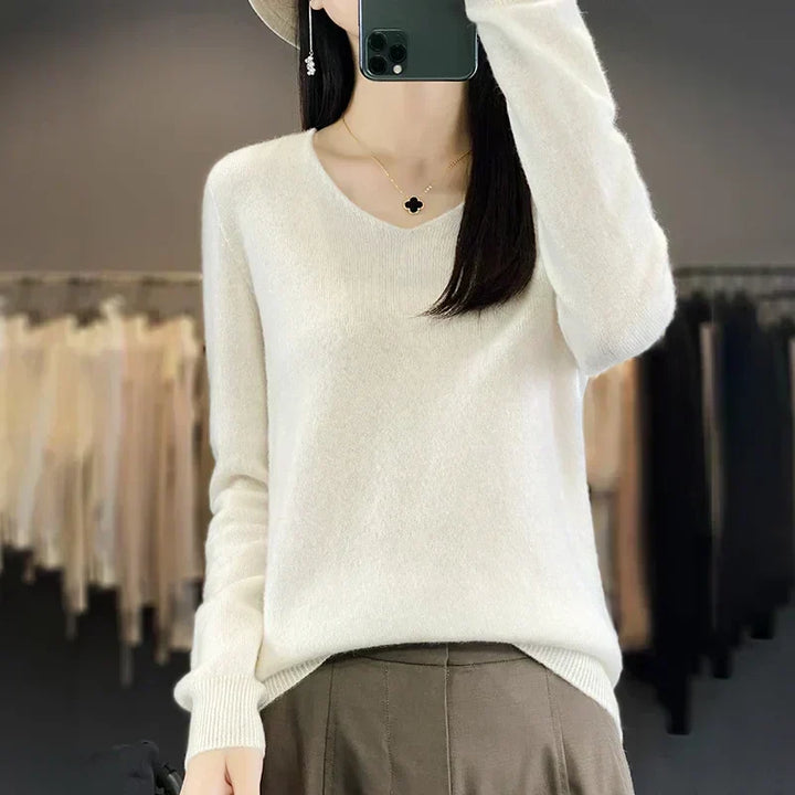Pullover versátil de mujer, cuello V y manga larga, estilo casual y chic.