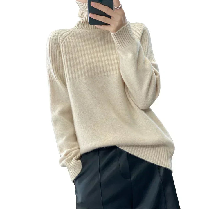 Suéter de mujer de cuello alto, prenda casual y elegante, ideal para días fríos de invierno.