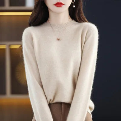 Suéter femenino de ajuste elegante, cuello redondo, manga larga, para las temporadas de otoño-invierno.