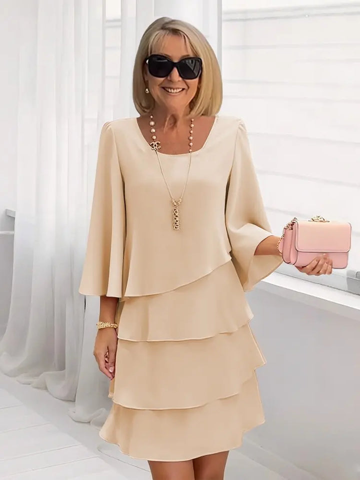 Vestido fluido de volantes para mujer, estilo elegante y cómodo, perfecto para ocasiones casuales de primavera.