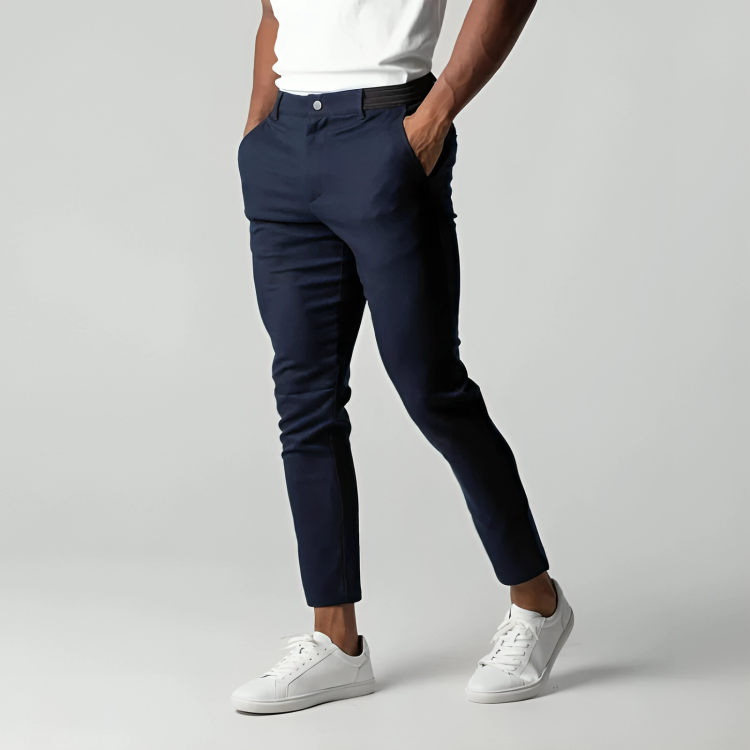Primer plano del tejido elástico de los chinos para hombre. Suavidad y flexibilidad garantizadas.
