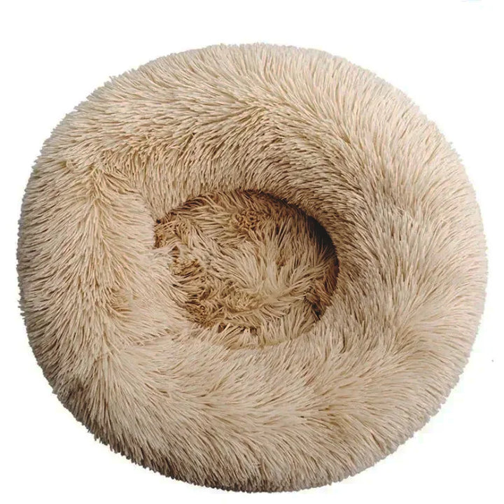 Cama de peluche ultra suave y redonda para mascotas, el lugar perfecto para el descanso de perros y gatos.