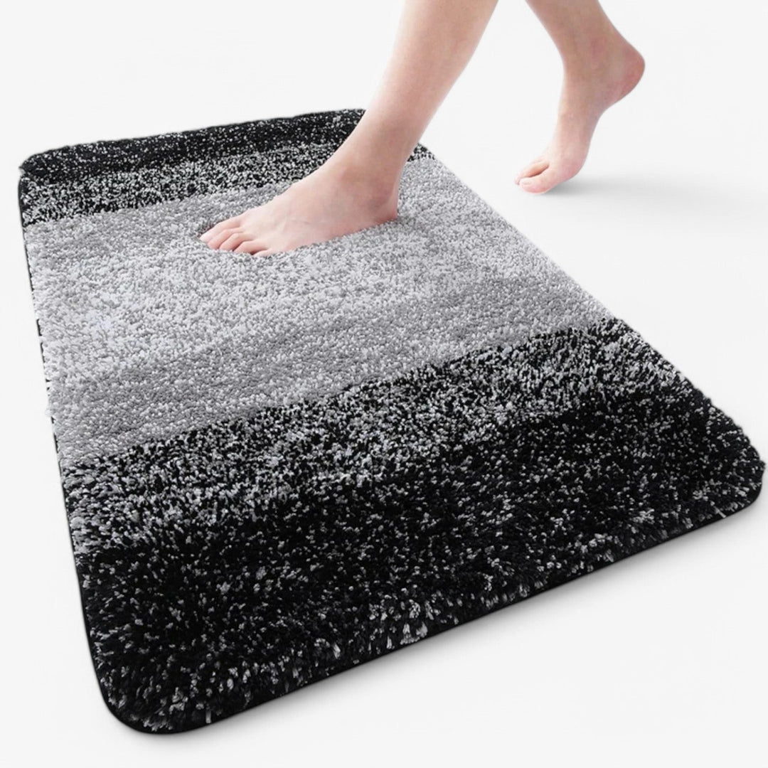 Alfombrilla de baño de microfibra súper absorbente y antideslizante. Ideal para ducha, aporta seguridad y confort en tu hogar.