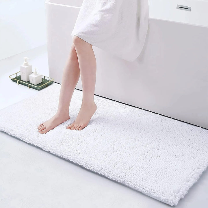 Confortable alfombra de baño súper absorbente. Diseño moderno y antideslizante para tu seguridad.