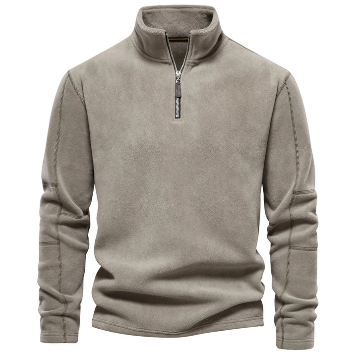 Chaqueta cortavientos para hombre, plegable y fácil de llevar, ideal para viajes y protección ligera.