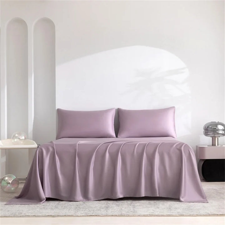 Juego completo de sábanas para cama, ofreciendo suavidad, transpirabilidad y lujo para el confort del hogar.