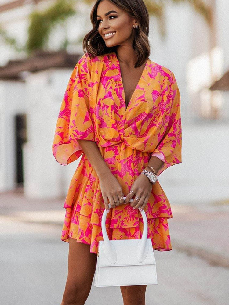 Vestido mini floral para mujer con escote en V, ideal para verano o primavera, estilo chic.