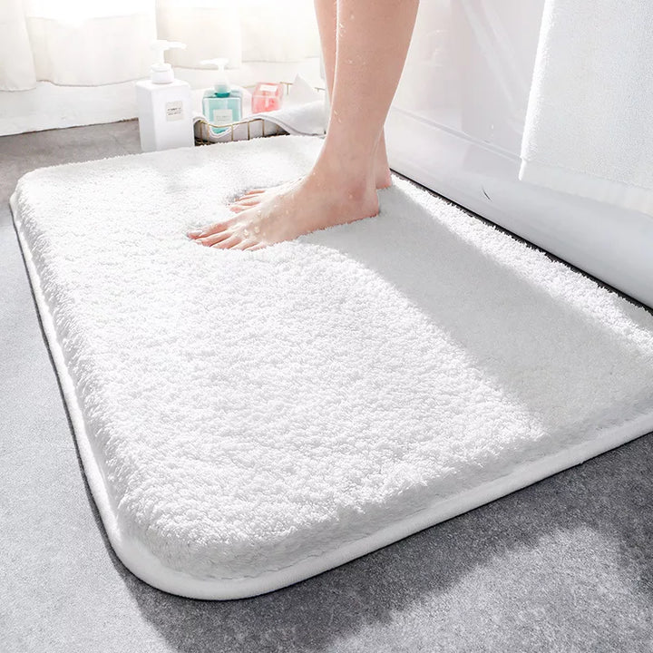 Alfombra de baño de microfibra suave que absorbe agua, antideslizante, ideal para pie seco y confort.