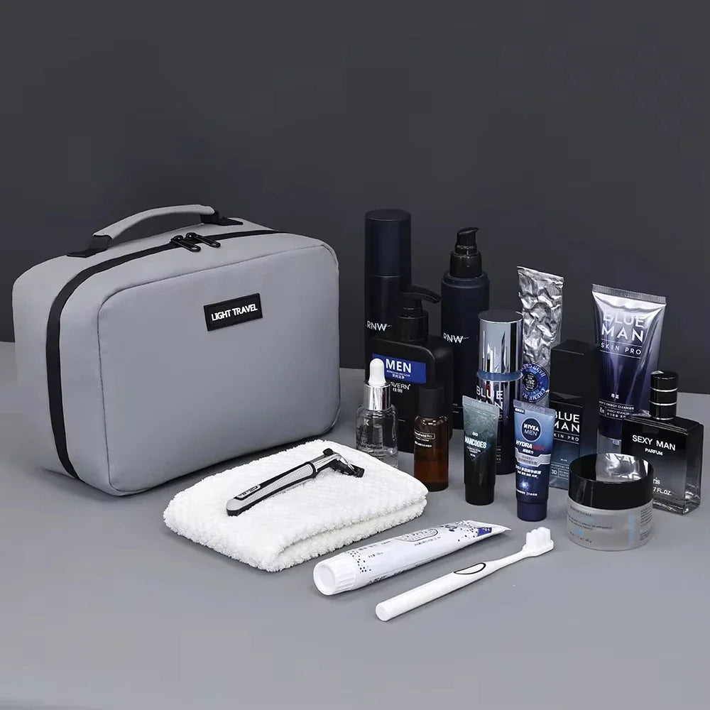 Neceser de viaje abierto mostrando compartimentos, organizador de aseo impermeable para accesorios de viaje.