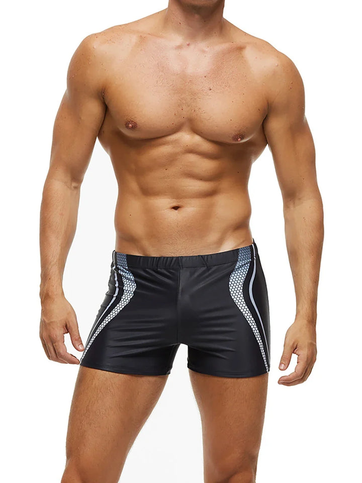 Bañador bóxer de hombre, diseño geométrico vanguardista. Perfecta ropa de baño para un verano con estilo.