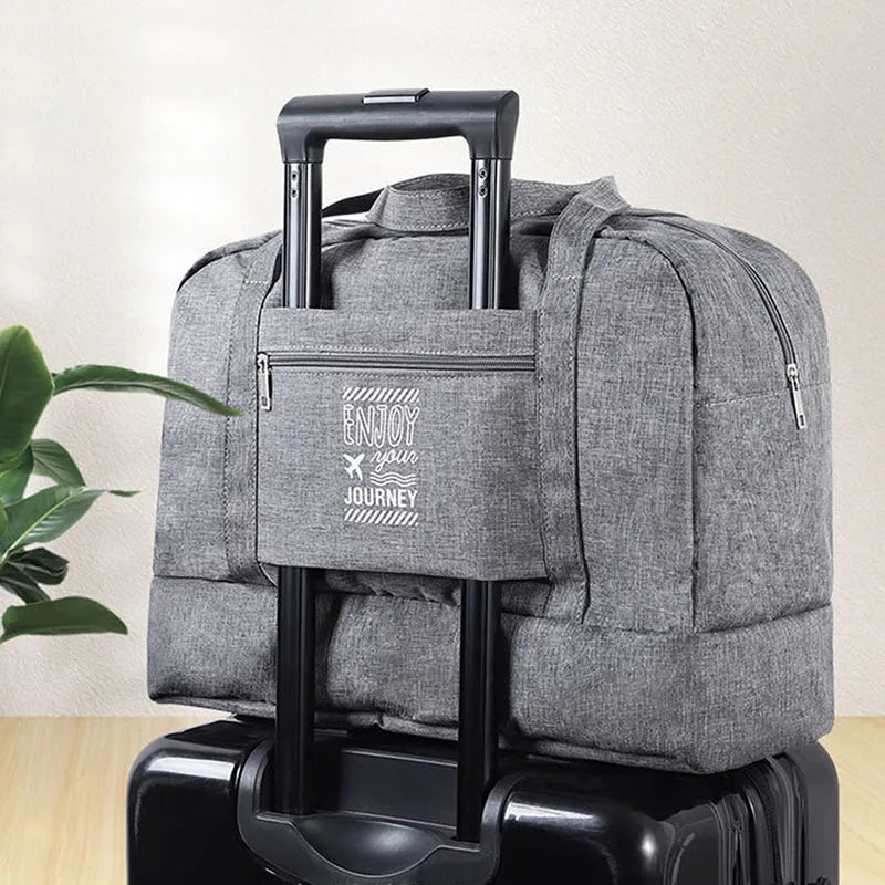 Bolsa de viaje plegable para mujer, ideal fin de semana y deporte. Espaciosa y resistente al agua.