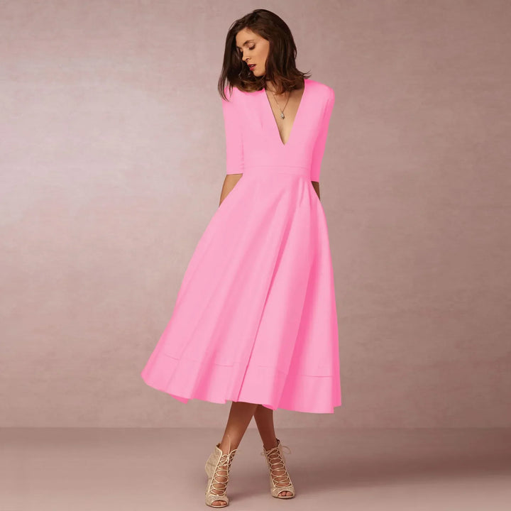 Vestido midi para eventos y fiestas de mujer. Escote en V y mangas al codo para un look elegante.