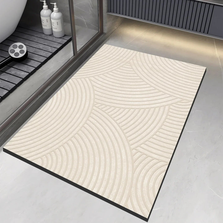 Alfombra de baño superabsorbente gris, antideslizante, ideal para ducha y seguridad.