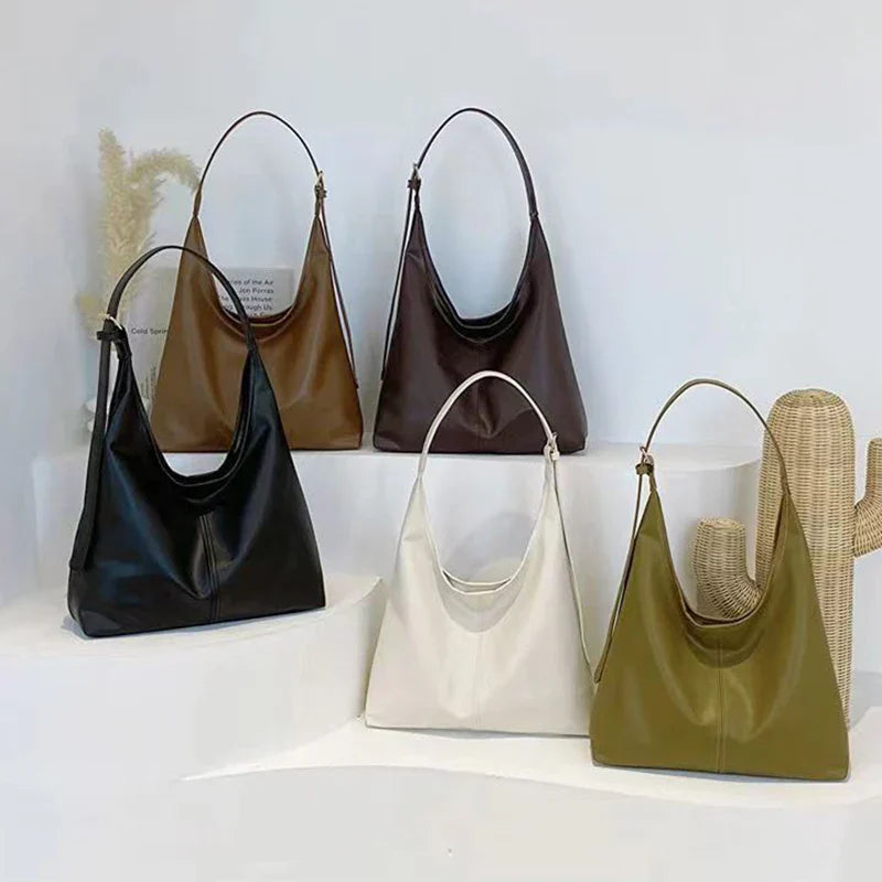 Bolso minimalista elegante para mujer, accesorio de moda versátil de cuero sintético, ideal para cualquier ocasión.