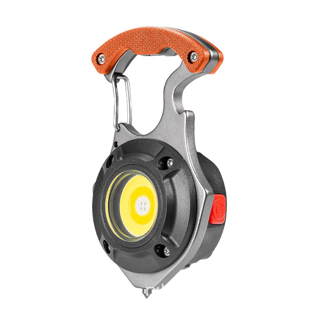 Luz COB portátil de supervivencia con llavero integrado, perfecta para aire libre y camping.